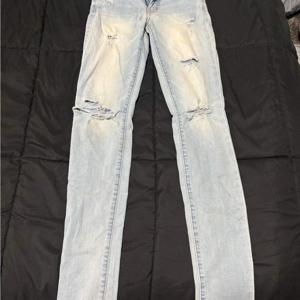 Women's Light Blue Distressed Jeans